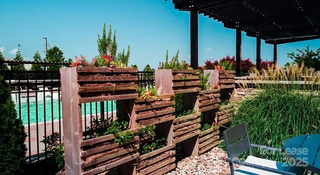 a kitchen with a sink stove and a refrigerator