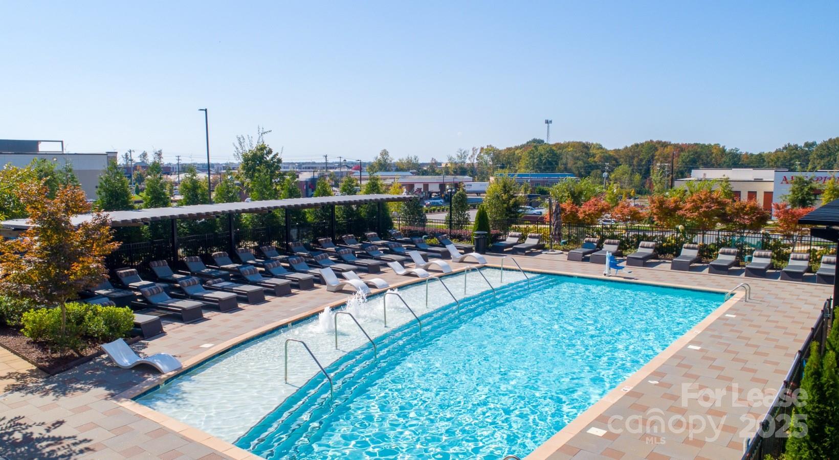 6408 Providence Farm Lane, Unit B2 Charlotte, NC 28277 - Photo 2 of 44 a view of a city with tall buildings