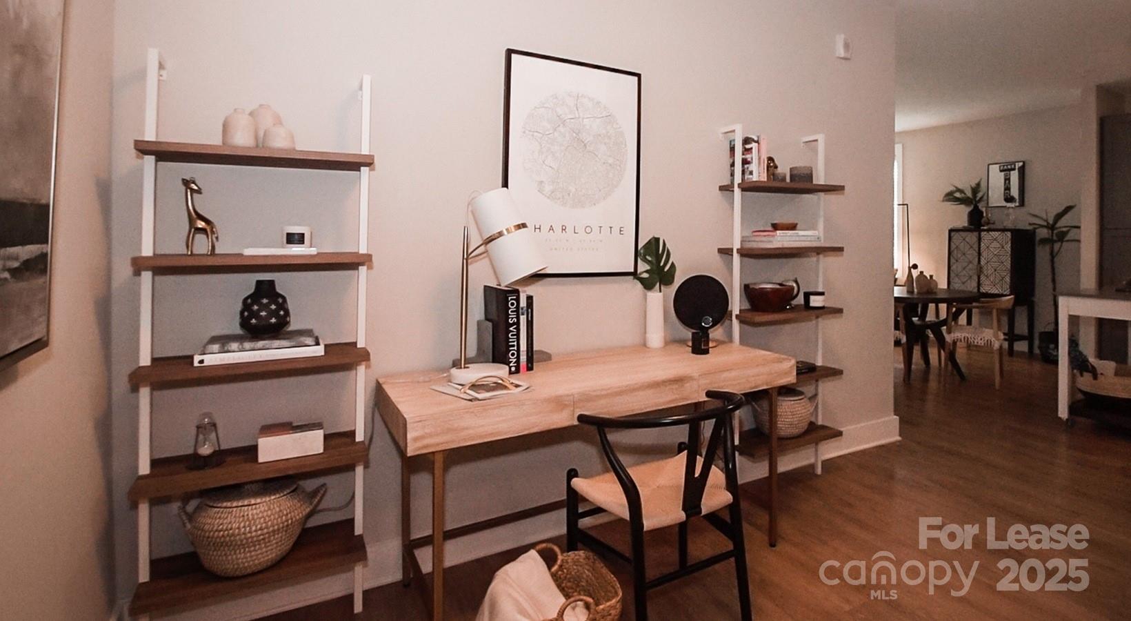 6408 Providence Farm Lane, Unit B2 Charlotte, NC 28277 - Photo 24 of 44 a view of a dining room with furniture and wooden floor