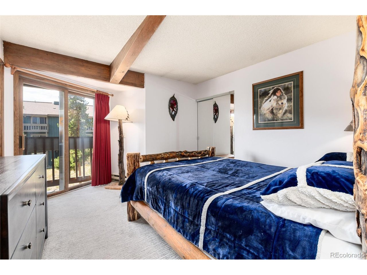 490 Kings Crossing Road, Unit 631 Winter Park, CO 80482 - Photo 22 of 43 a bedroom with a bed and window