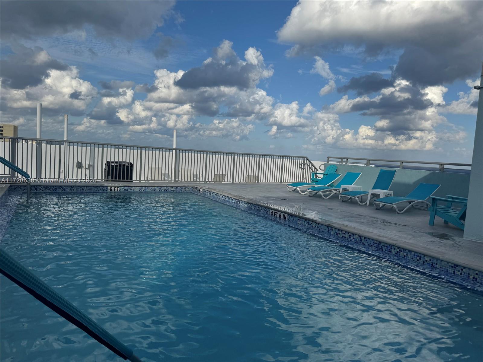 400 North Surf Road, Unit 701 Hollywood, FL 33019 - Photo 21 of 26 a view of balcony with wooden floor