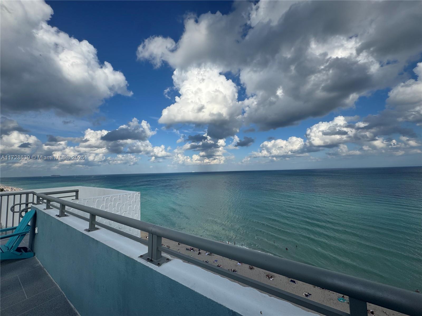 400 North Surf Road, Unit 701 Hollywood, FL 33019 - Photo 23 of 26 a view of a lake from a balcony