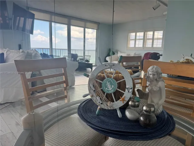 a room with furniture and a large window