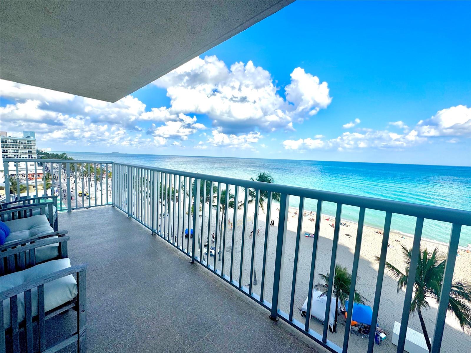 400 North Surf Road, Unit 701 Hollywood, FL 33019 - Photo 7 of 26 a view of a porch with furniture