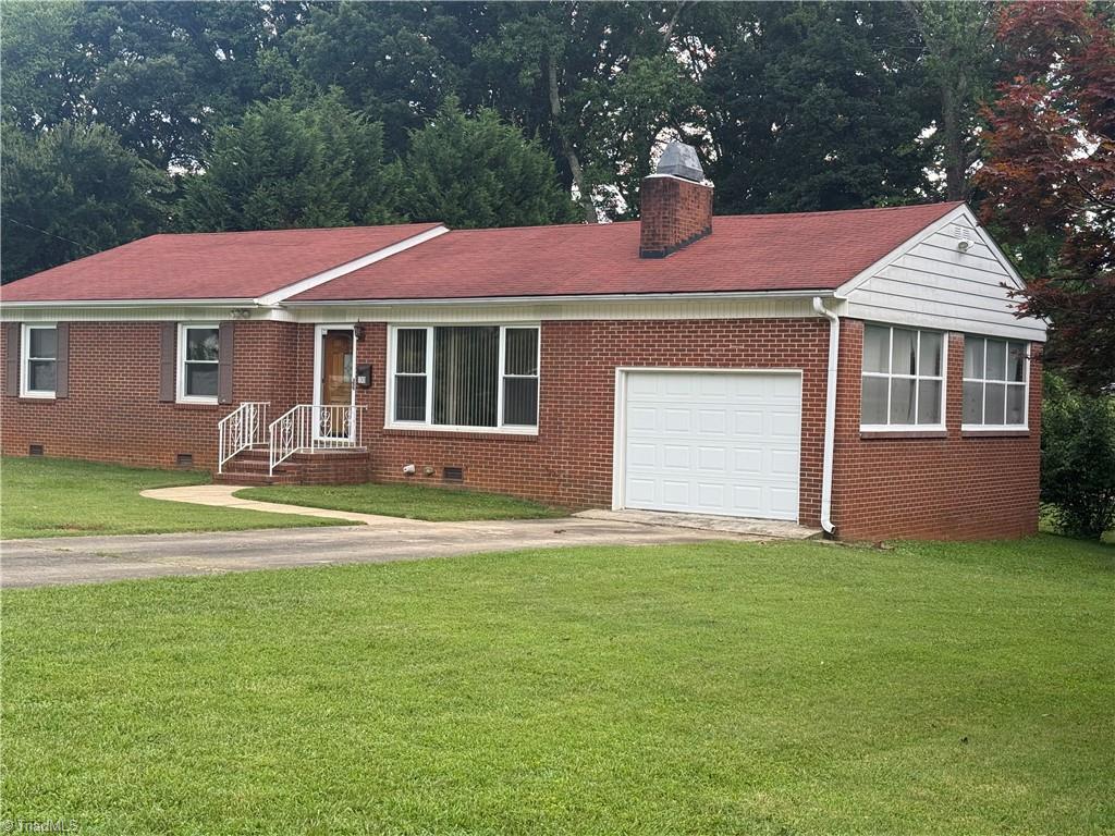 100 Kirk Road Greensboro, NC 27455 - Photo 1 of 42 Corner lot 3bedrooms 2full baths,tiled floor in attached garage with wall of windows. Freshly refinished red oak floors, new kitchen flooring,countertops, paint & stainless steel dishwasher