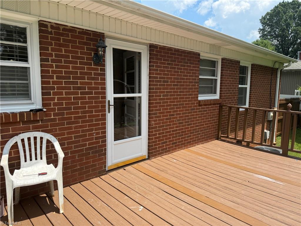 100 Kirk Road Greensboro, NC 27455 - Photo 19 of 42 Back entrance off deck into kitchen
