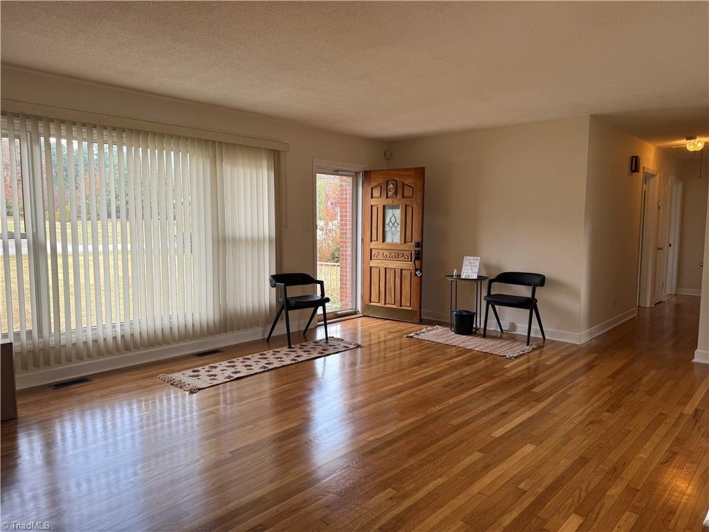100 Kirk Road Greensboro, NC 27455 - Photo 2 of 42 Freshly refinished floors ! Absolutely gorgeous! (Please remove shoes or wear booties) come to see this beautiful home!