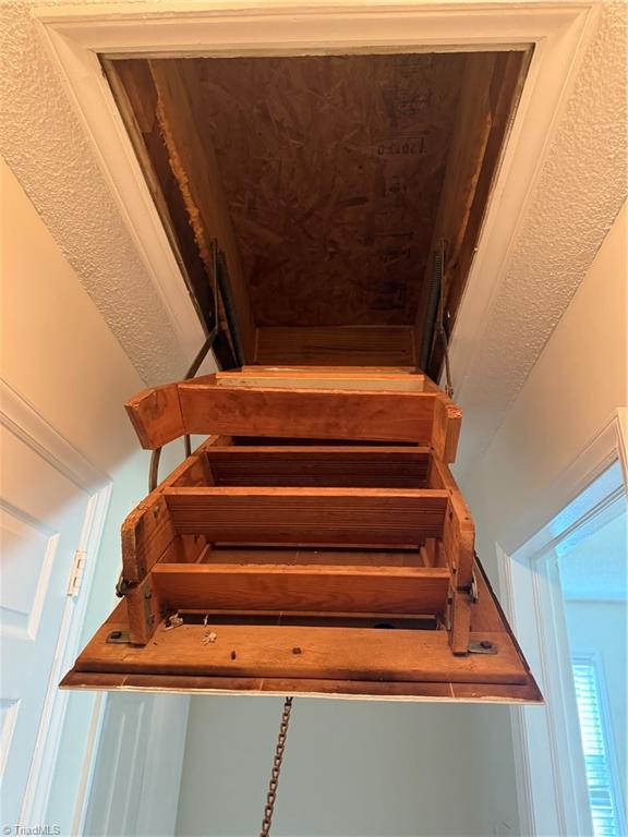 100 Kirk Road Greensboro, NC 27455 - Photo 28 of 42 Pull down attic stairs with enclosed box for conditioned air not escape in attic