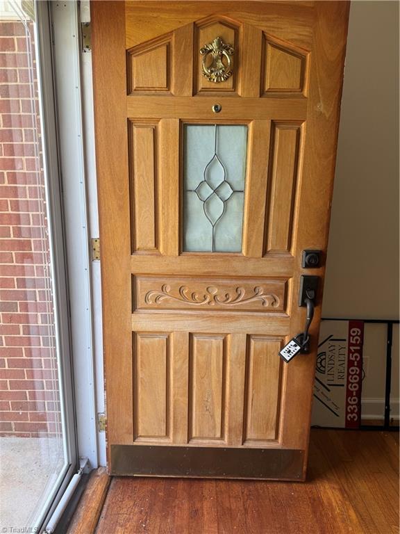 100 Kirk Road Greensboro, NC 27455 - Photo 29 of 42 Nice wood front door w glass insert