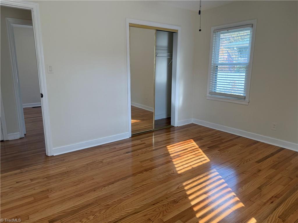 100 Kirk Road Greensboro, NC 27455 - Photo 10 of 42 Primary bedroom with full tiled bath, walk in shower