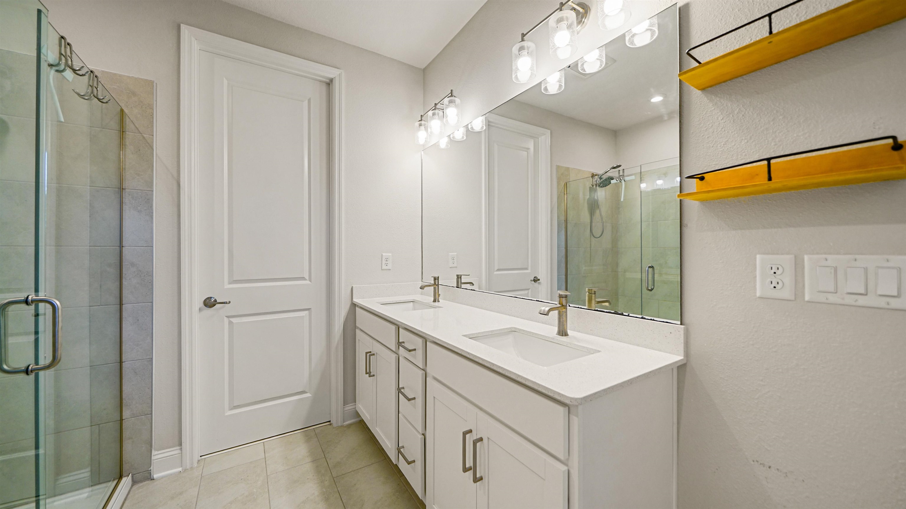 14141 Backbarrier Road Jacksonville, FL 32224 - Photo 18 of 45 a bathroom with a sink shower and a mirror