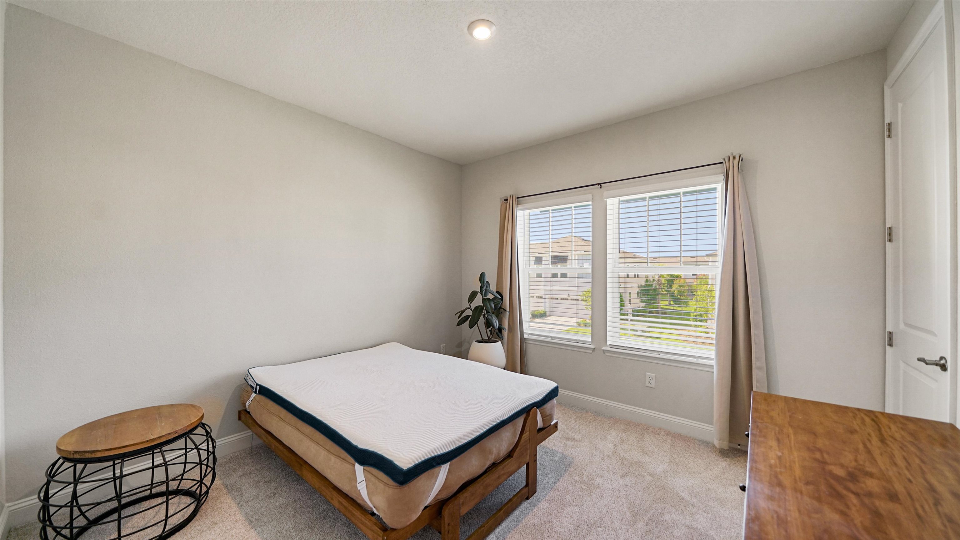 14141 Backbarrier Road Jacksonville, FL 32224 - Photo 20 of 45 a room with a bed and a window