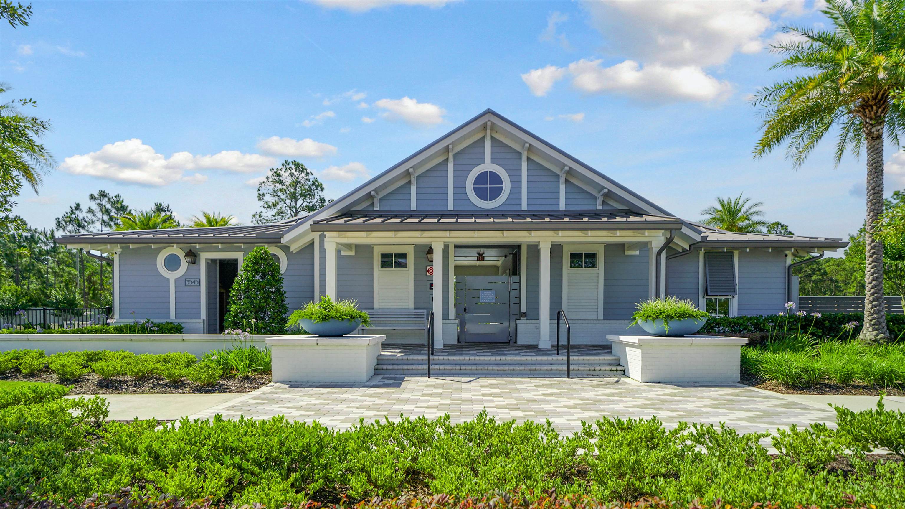 14141 Backbarrier Road Jacksonville, FL 32224 - Photo 37 of 45 a front view of a house with a garden and plants