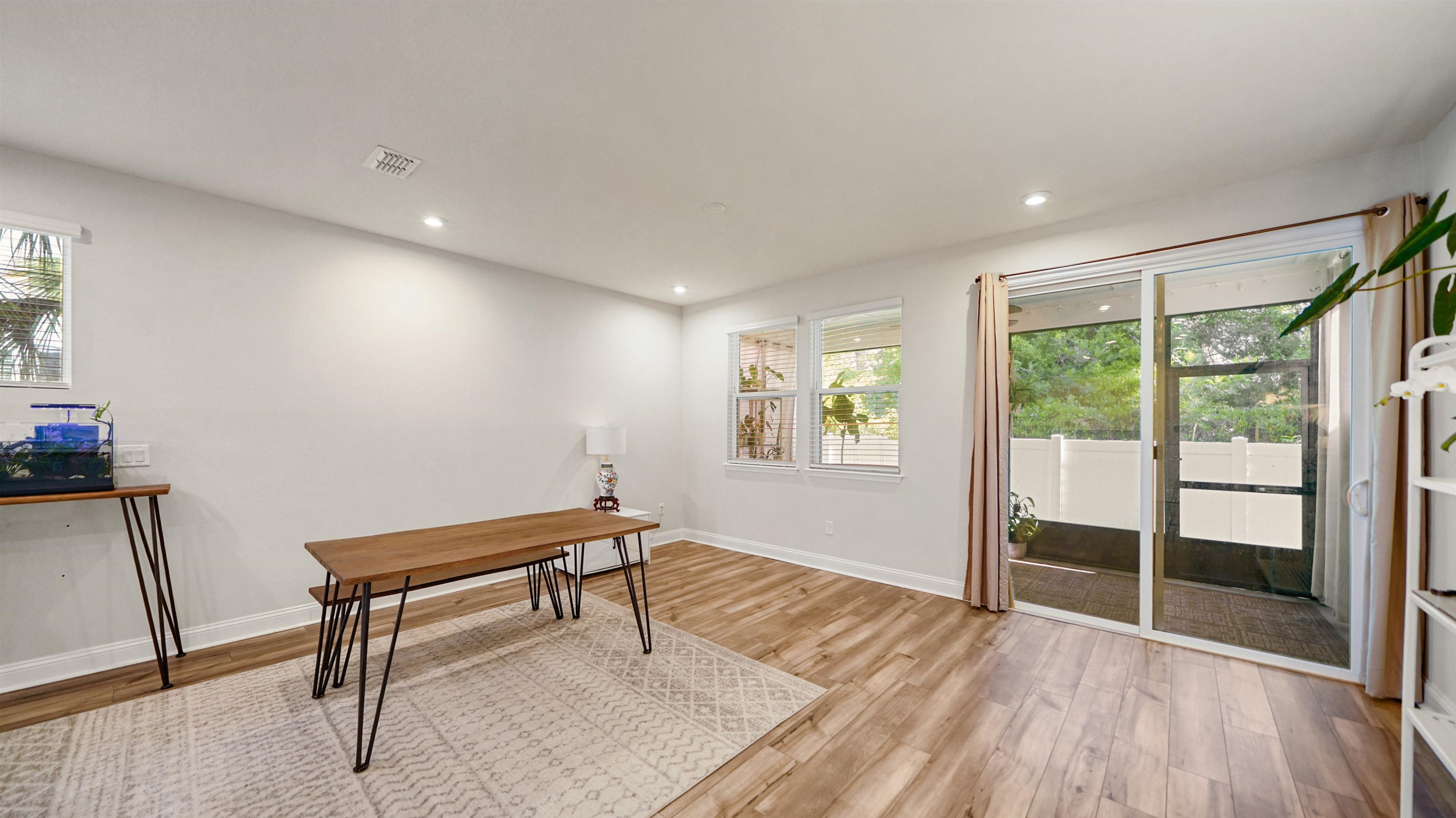 14141 Backbarrier Road Jacksonville, FL 32224 - Photo 6 of 45 a room with furniture and a window