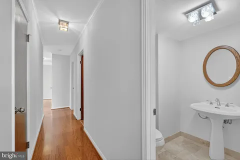 a view of a hallway with washer and dryer