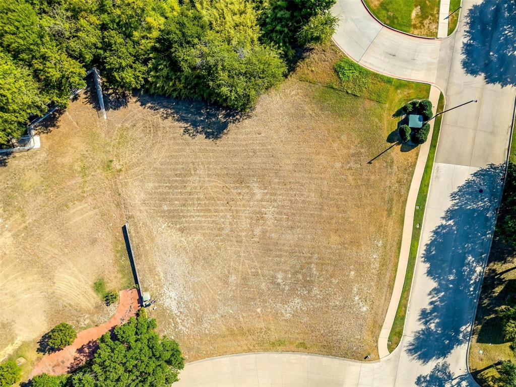 6513 Haig Point Court Fort Worth, TX 76132 - Photo 11 of 37 a bathroom with a shower
