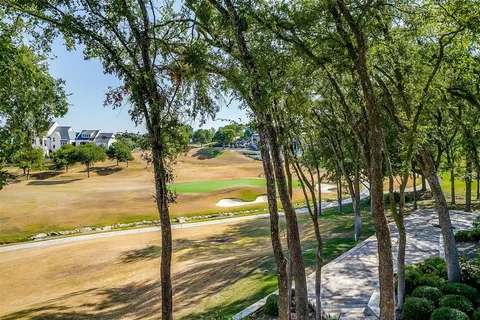 a view of a yard with an outdoor space