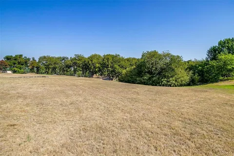 a view of an outdoor space and a yard