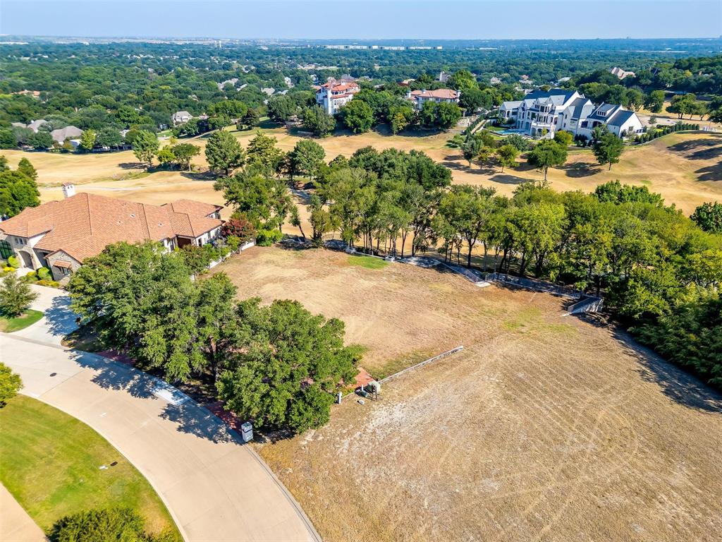 6513 Haig Point Court Fort Worth, TX 76132 - Photo 6 of 37 a view of a street with a yard