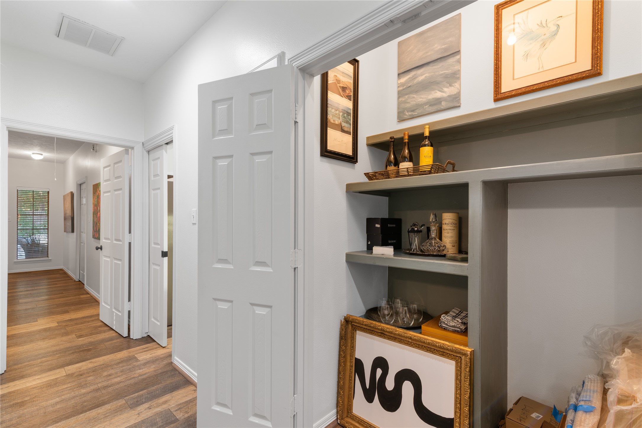 901 Longmire Road, Unit 51 Conroe, TX 77304 - Photo 40 of 48 Closet turned hidden bar. Add a cart and drinks of your choice.