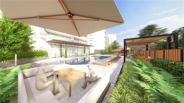 a view of building with a garden