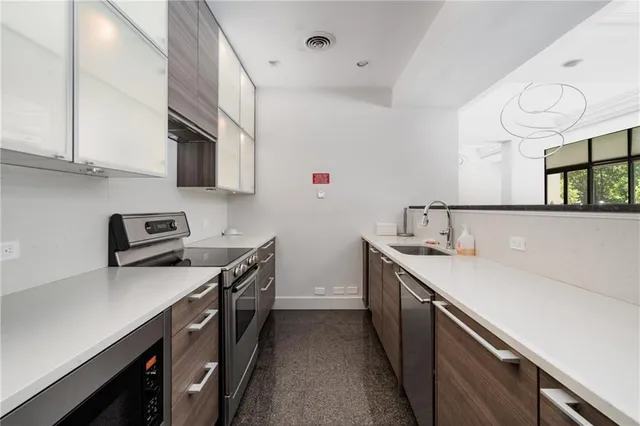 a view of a swimming pool with a patio