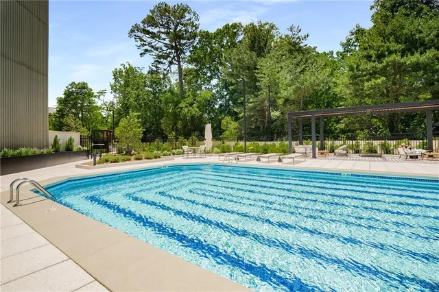 a view of the house with large windows