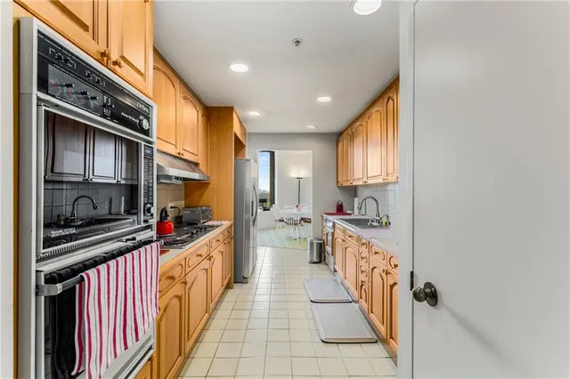 a view of a livingroom with furniture and front door