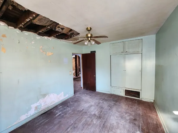 a bath tub sitting next to a window
