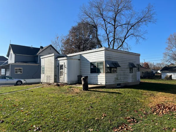 a house view with a garden space