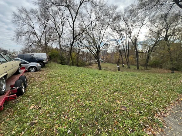 a view of outdoor space with deck and yard