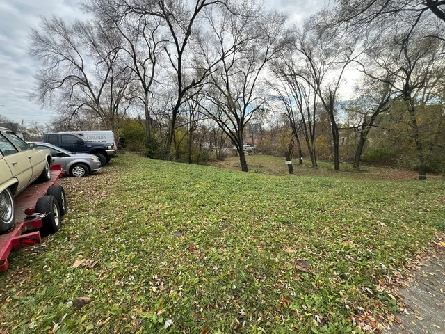 a view of outdoor space with deck and yard