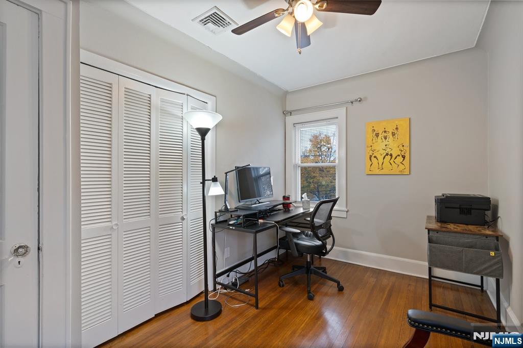 74 Kipp Avenue Hasbrouck Heights, NJ 07604 - Photo 21 of 28 a view of a workspace with furniture and a window
