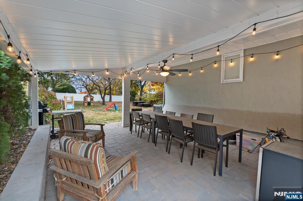 74 Kipp Avenue Hasbrouck Heights, NJ 07604 - Photo 23 of 28 a view of a dining room with furniture window and outside view