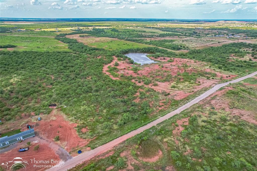 310 Meadow Valley Road Abilene, TX 79601 - Photo 3 of 6 a view of a field of an ocean and a yard