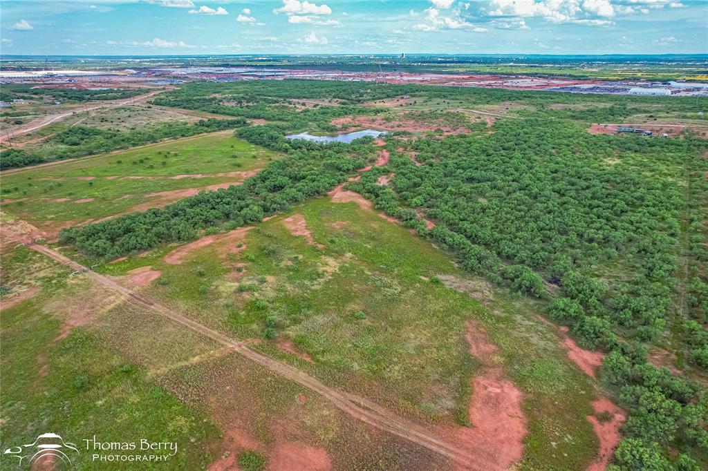 310 Meadow Valley Road Abilene, TX 79601 - Photo 4 of 6 a view of a field with an empty space