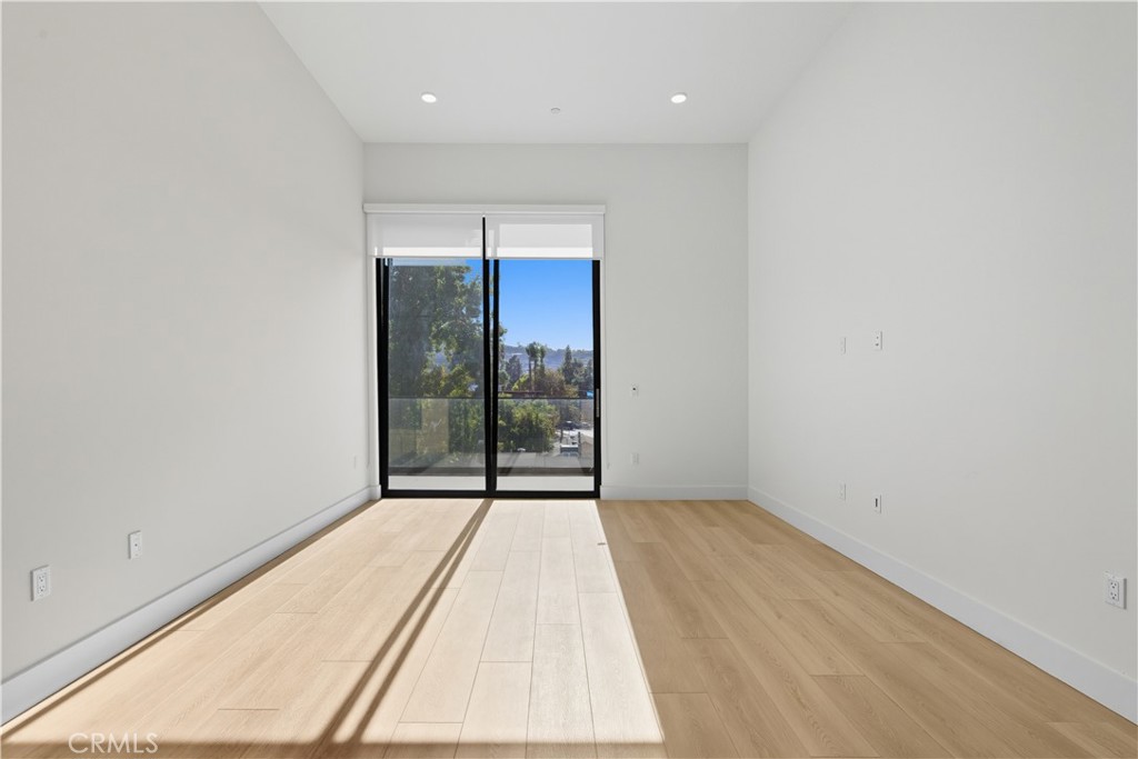 12078 Guerin Street, Unit 406 Studio City, CA 91604 - Photo 12 of 16 an empty room with entrance door