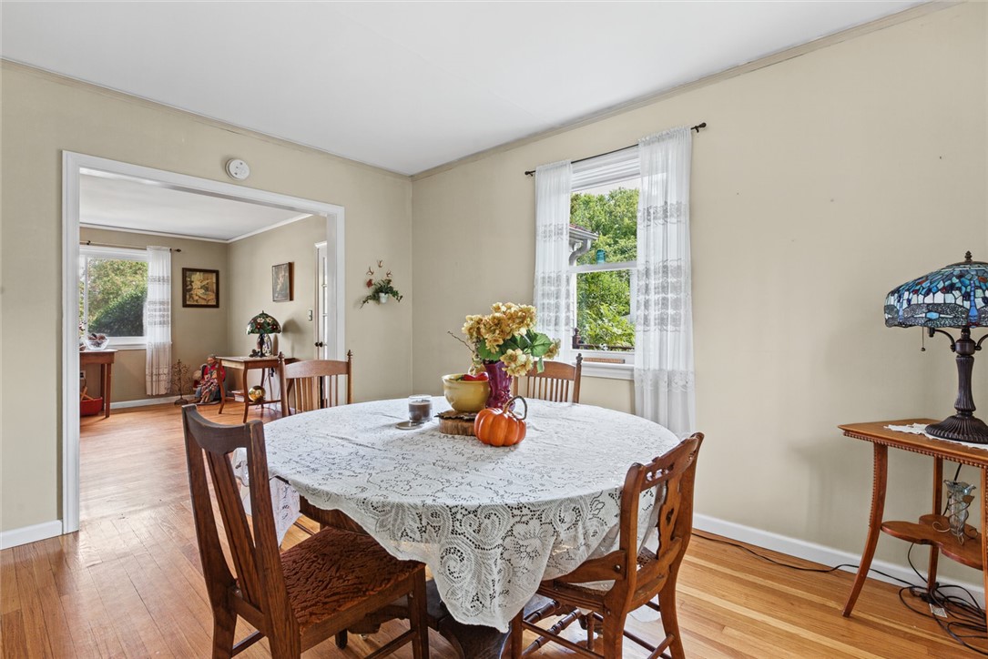 2028 Moultrie Square Anderson, SC 29621 - Photo 19 of 30 Gleaming hardwood floors and a wide cased opening highlight this traditional dining space.