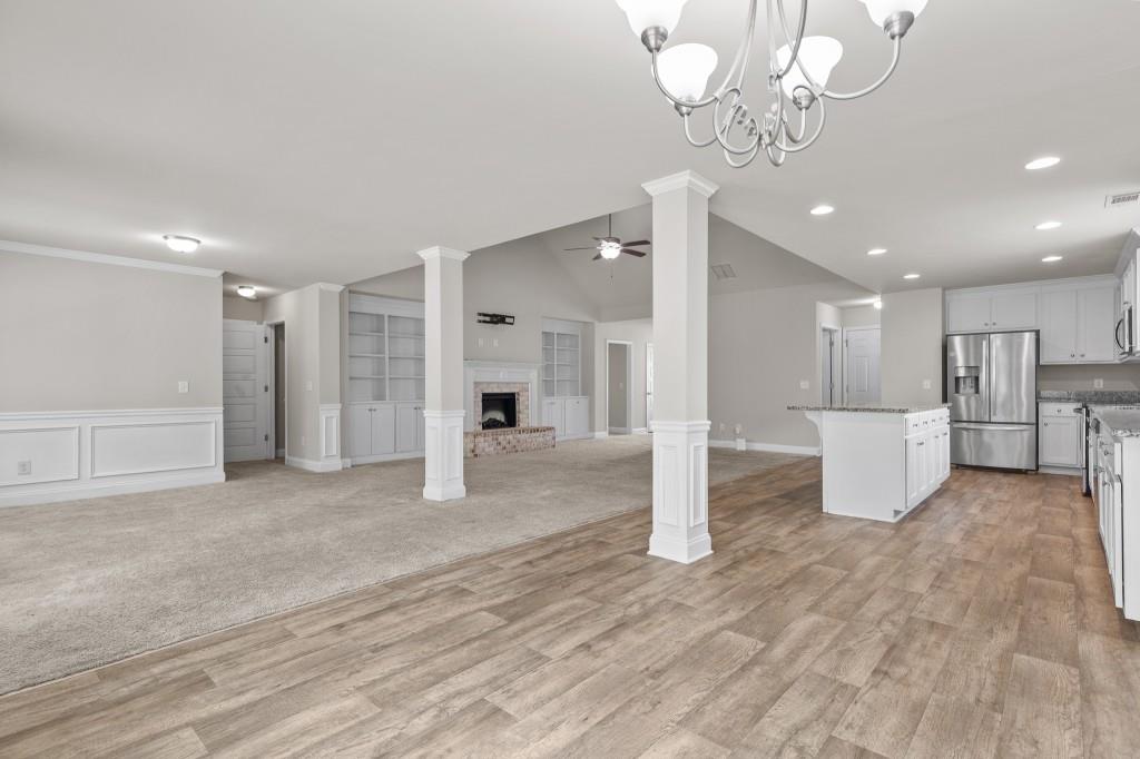 320 Lokeys Lane Bethlehem, GA 30620 - Photo 17 of 44 a view of a big room with wooden floor and windows