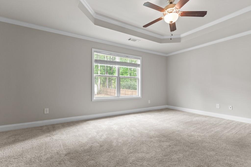 320 Lokeys Lane Bethlehem, GA 30620 - Photo 20 of 44 an empty room with a window and a fan