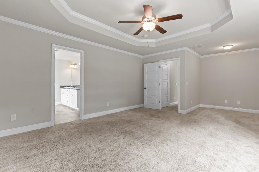 320 Lokeys Lane Bethlehem, GA 30620 - Photo 21 of 44 en empty room with fan and a ceiling fan