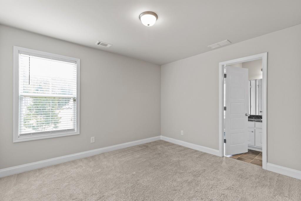 320 Lokeys Lane Bethlehem, GA 30620 - Photo 30 of 44 a view of an empty room with a window