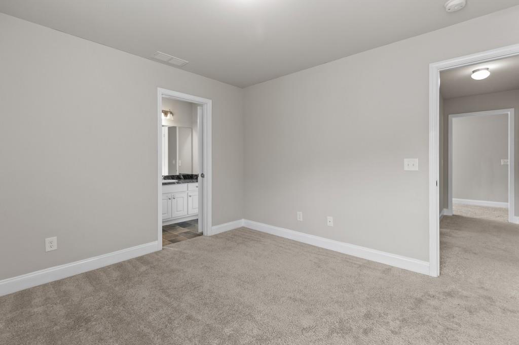 320 Lokeys Lane Bethlehem, GA 30620 - Photo 31 of 44 an empty room with an empty space and wooden floor