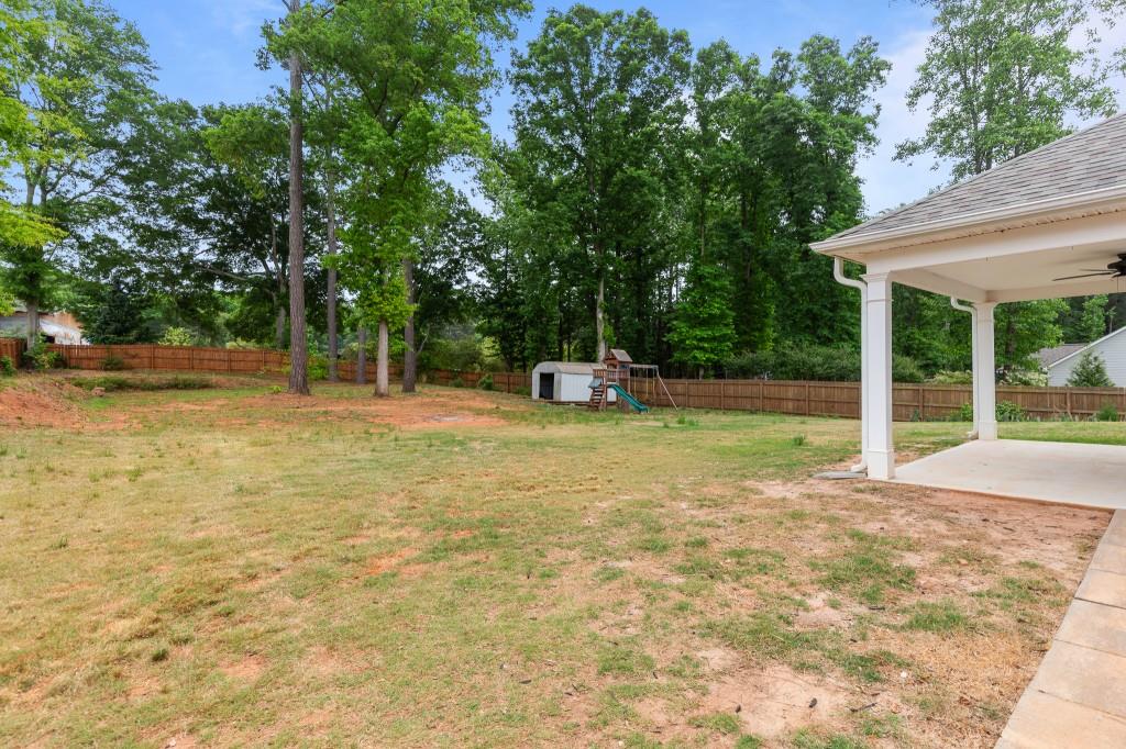 320 Lokeys Lane Bethlehem, GA 30620 - Photo 39 of 44 a house with trees in front of it