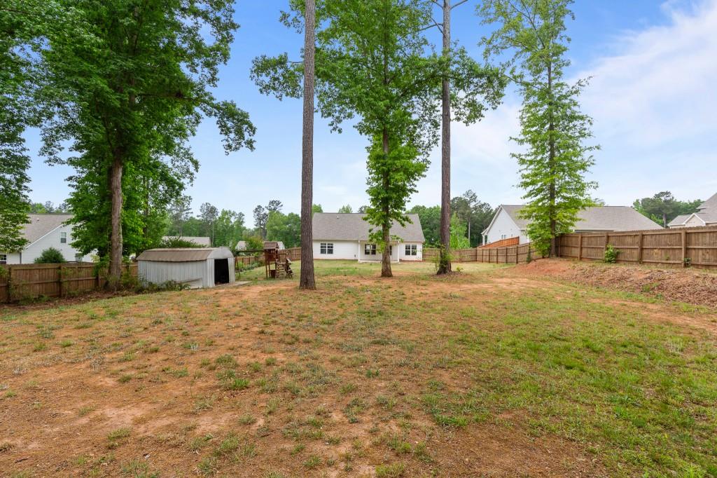 320 Lokeys Lane Bethlehem, GA 30620 - Photo 40 of 44 a view of backyard of house with green space