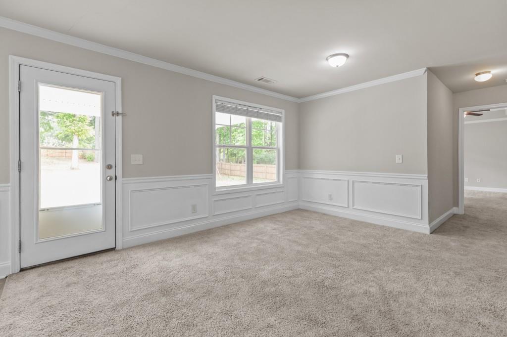 320 Lokeys Lane Bethlehem, GA 30620 - Photo 8 of 44 an empty room with windows