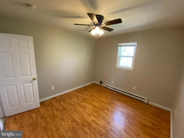a view of a livingroom with a flat screen tv