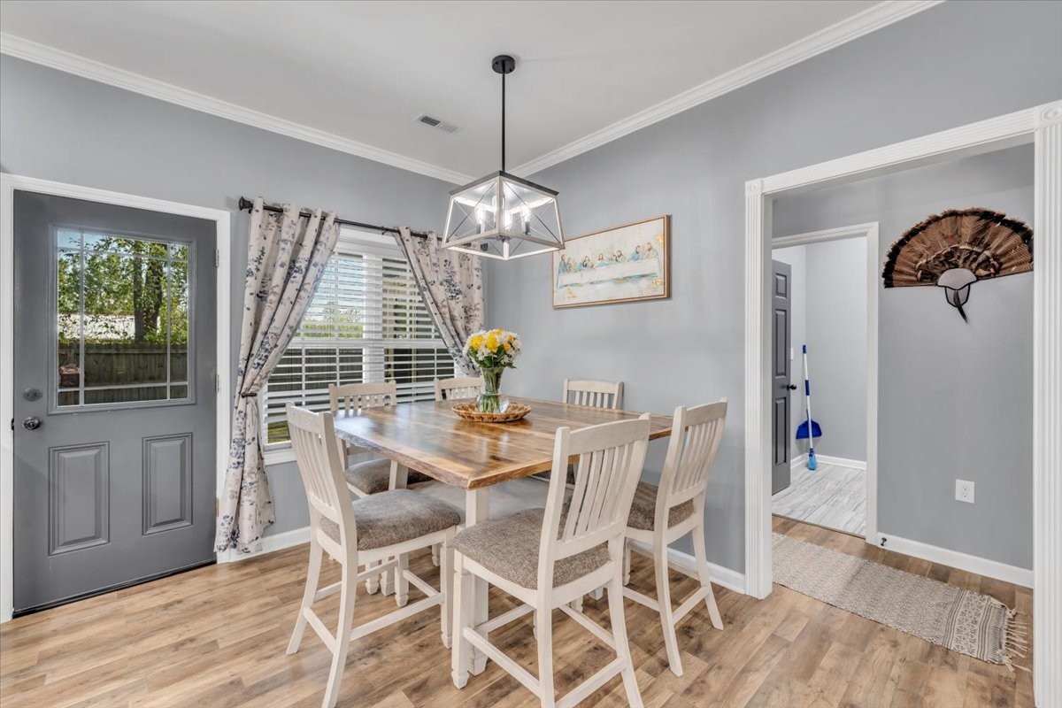 8 Valley Pond Lane Kelso, TN 37348 - Photo 12 of 75 a view of a dining room with furniture window and wooden floor