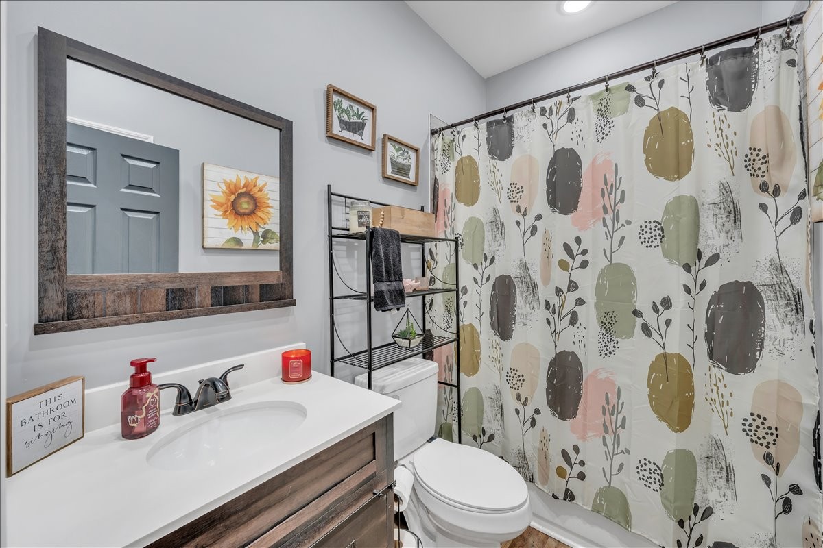 8 Valley Pond Lane Kelso, TN 37348 - Photo 23 of 75 a bathroom with a sink and a white toilet