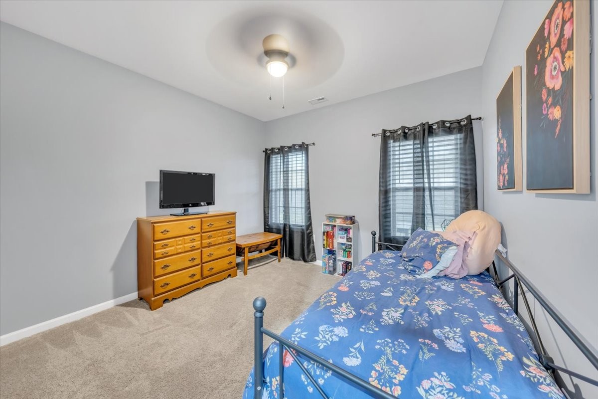 8 Valley Pond Lane Kelso, TN 37348 - Photo 24 of 75 a bedroom with furniture and flat screen tv
